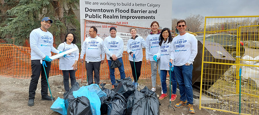 group photo from PullingOurWeight cleanup event at Dow Canada